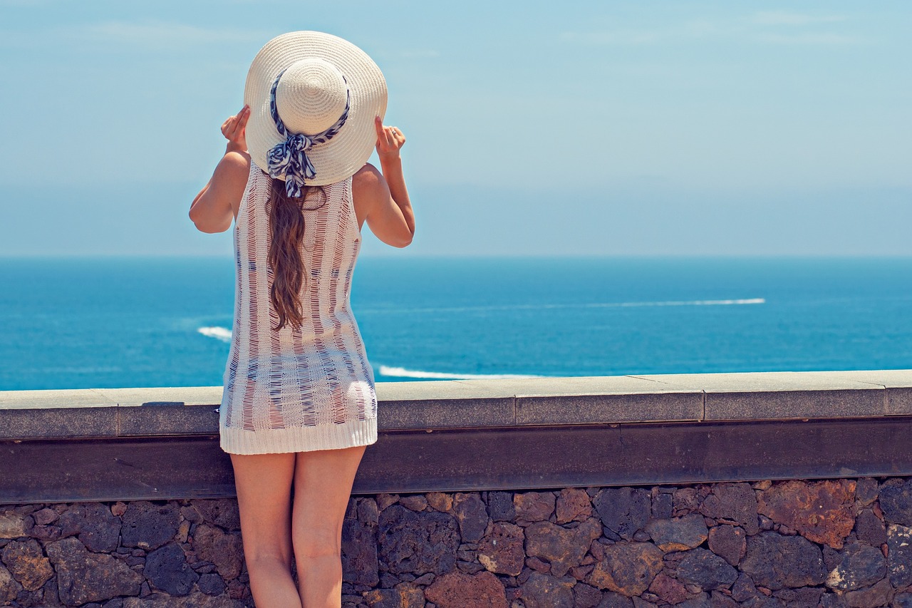 summer, holiday, young woman, woman, ocean, sea, excursion, gran canaria, canary islands, mood, beach, vacation, holidays, sun hat, headwear, sun protection, blue beach, blue sun, blue sea, blue summer, blue ocean, nature, blue island