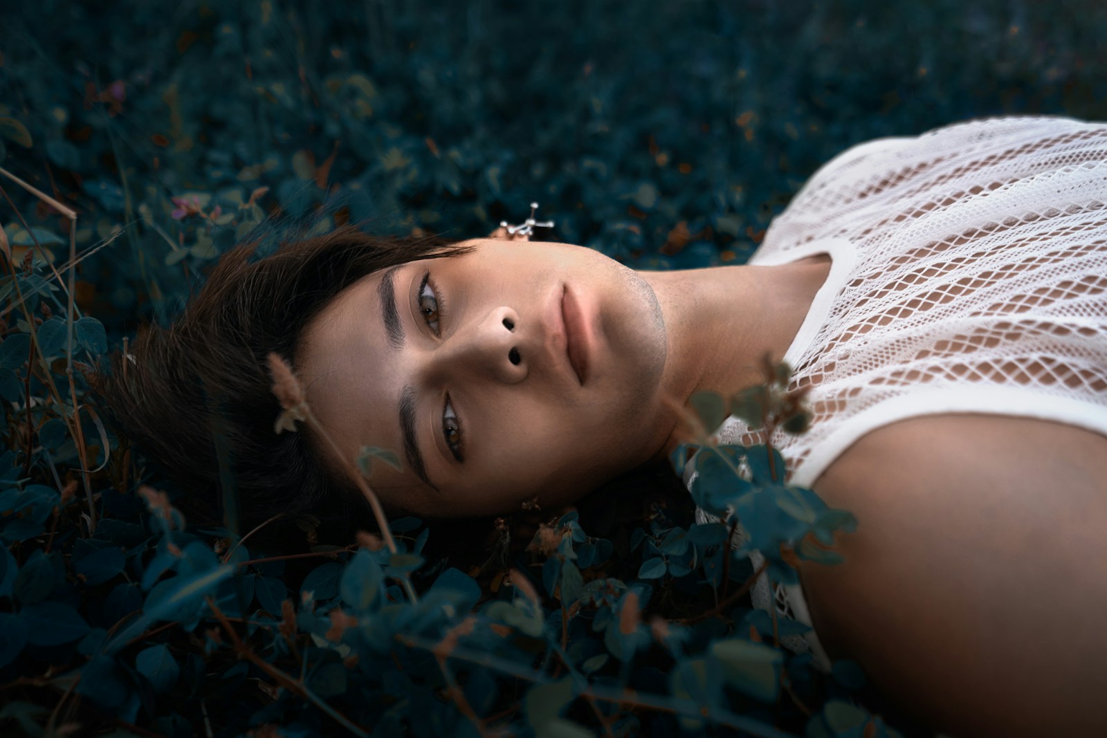 a person lying in the grass